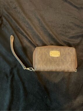 Michael Kors Brown Monogram Wristlet Clutch with Gold-tone Plaque